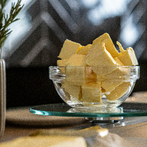 a glass dish of butter cubes