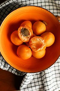 a bowl of apricots