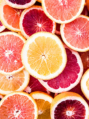 a variety of colorful grapefruit slices
