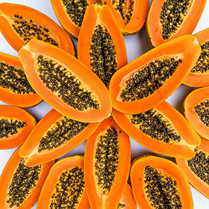 several papaya halves