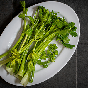 several celery stalks on a plate