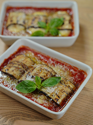 a baking dish of eggplant parmesan
